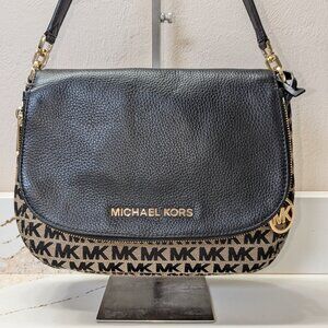 Michael Kors fold-over flap bag in canvas and leather. EUC!